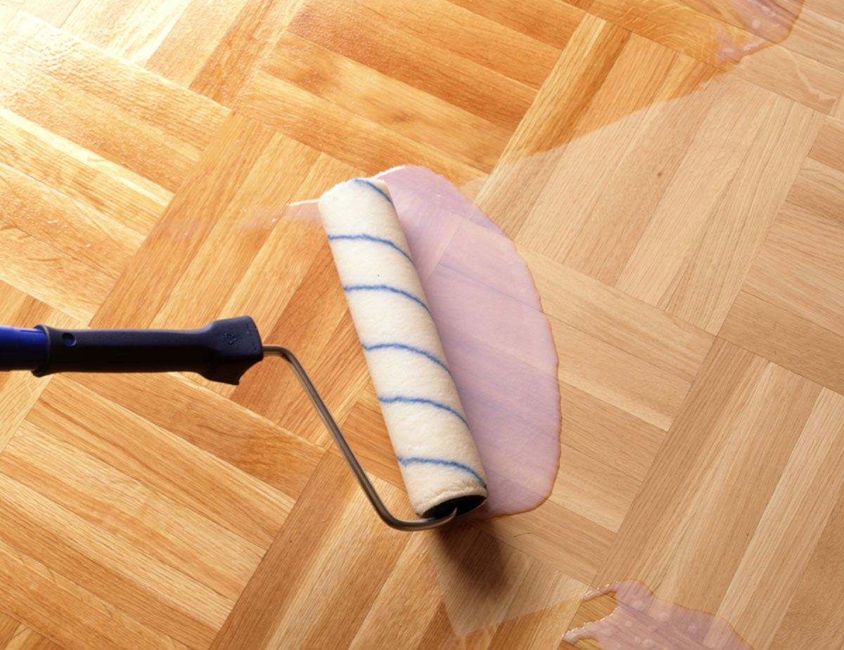 Applying lacquer finish to wood floor
