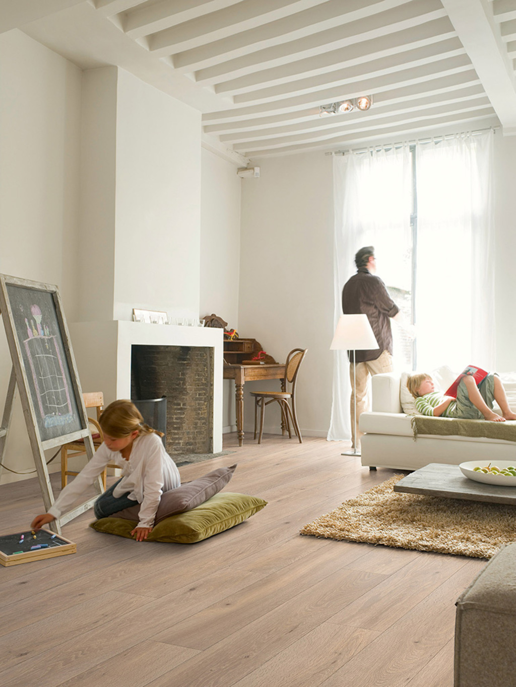 Home with children and laminate from QuickStep
