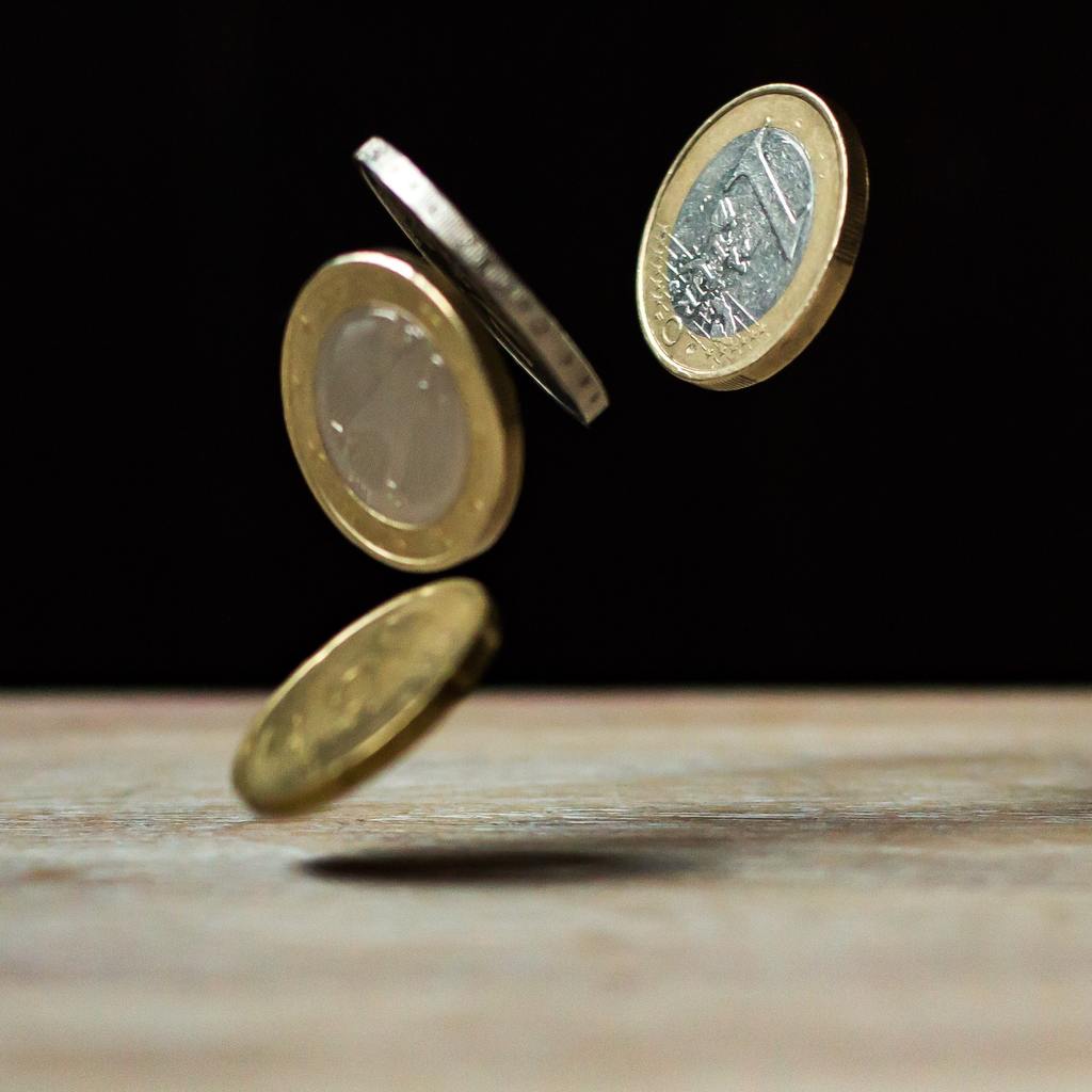 Money on wooden flooring